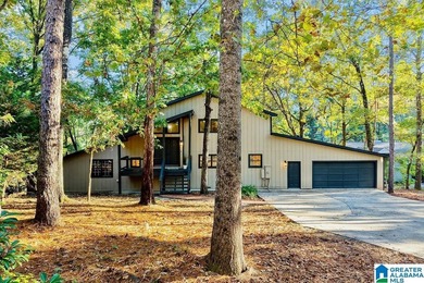 Spacious 1.5 story home with fully finished basement in the on Stillwaters Golf and Country Club in Alabama - for sale on GolfHomes.com, golf home, golf lot