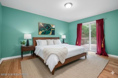 Welcome to your ultimate Poconos retreat!This magnificent on Country Club of the Poconos Golf Course in Pennsylvania - for sale on GolfHomes.com, golf home, golf lot