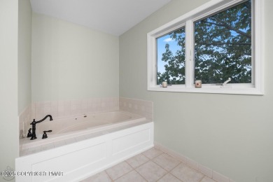 PRICE IMPROVEMENT!! - Welcome to your ultimate Poconos on Country Club of the Poconos Golf Course in Pennsylvania - for sale on GolfHomes.com, golf home, golf lot