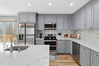 This turnkey, well-maintained home features a new kitchen, new on The Hideout Golf in Pennsylvania - for sale on GolfHomes.com, golf home, golf lot