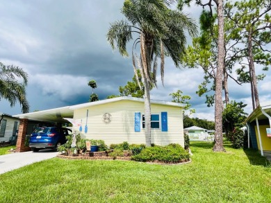 Welcome to this 2-bedroom, 2-bathroom home located in the gated on Pine Lakes Country Club in Florida - for sale on GolfHomes.com, golf home, golf lot