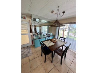 Welcome to this 2-bedroom, 2-bathroom home located in the gated on Pine Lakes Country Club in Florida - for sale on GolfHomes.com, golf home, golf lot