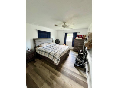 Welcome to this 2-bedroom, 2-bathroom home located in the gated on Pine Lakes Country Club in Florida - for sale on GolfHomes.com, golf home, golf lot