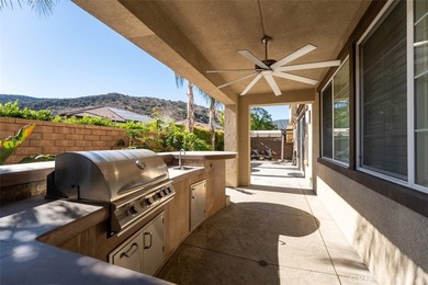 Experience luxury living in this stunning 5-bedroom, 4.5-bath on Glen Ivy Golf Club in California - for sale on GolfHomes.com, golf home, golf lot