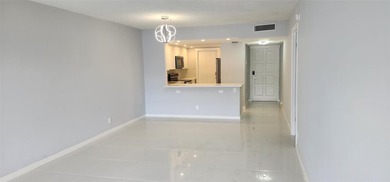 Spacious Remodel Balcony/Sunroom enclosed for additional living on Palm-Aire Country Club and Resort - The Oaks in Florida - for sale on GolfHomes.com, golf home, golf lot