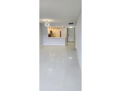 Spacious Remodel Balcony/Sunroom enclosed for additional living on Palm-Aire Country Club and Resort - The Oaks in Florida - for sale on GolfHomes.com, golf home, golf lot