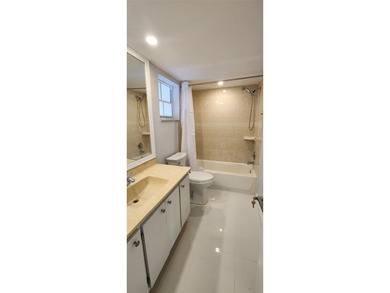 Spacious Remodel Balcony/Sunroom enclosed for additional living on Palm-Aire Country Club and Resort - The Oaks in Florida - for sale on GolfHomes.com, golf home, golf lot