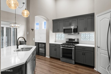 Discover carefree living in this beautifully remodeled 3 bedroom on Pueblo Del Sol Country Club in Arizona - for sale on GolfHomes.com, golf home, golf lot