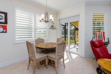 WOW! HERE IS AN AMAZING FIRST FLOOR COACH HOME WITH NUMEROUS on Hammock Bay in Florida - for sale on GolfHomes.com, golf home, golf lot