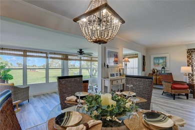 Direct golf course frontage with sweeping views from patio on Barefoot Bay Golf Course in Florida - for sale on GolfHomes.com, golf home, golf lot