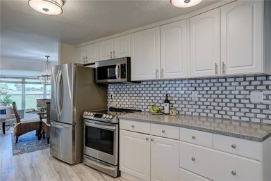 Direct golf course frontage with sweeping views from patio on Barefoot Bay Golf Course in Florida - for sale on GolfHomes.com, golf home, golf lot