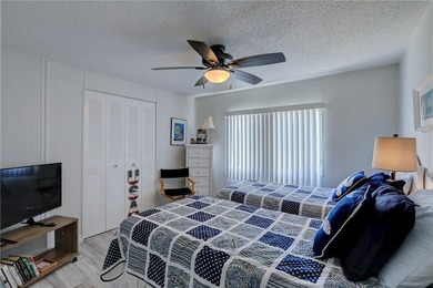 Direct golf course frontage with sweeping views from patio on Barefoot Bay Golf Course in Florida - for sale on GolfHomes.com, golf home, golf lot