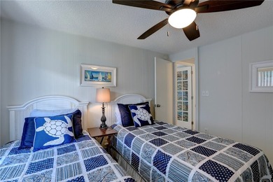 Direct golf course frontage with sweeping views from patio on Barefoot Bay Golf Course in Florida - for sale on GolfHomes.com, golf home, golf lot