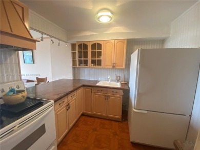 Experience the breathtaking views of a serene tropical golf on Turnberry Isle Resort and Club in Florida - for sale on GolfHomes.com, golf home, golf lot