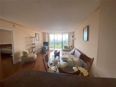 Experience the breathtaking views of a serene tropical golf on Turnberry Isle Resort and Club in Florida - for sale on GolfHomes.com, golf home, golf lot