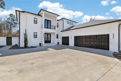 Experience luxury living in this meticulously maintained and on Oak Grove Island Golf and Country Club in Georgia - for sale on GolfHomes.com, golf home, golf lot