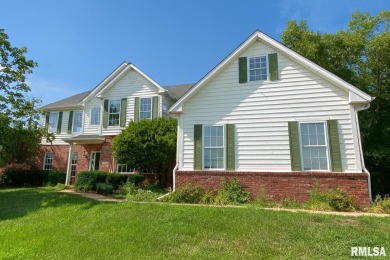 Located on a spacious corner lot just steps from the driving on WeaverRidge Golf Club in Illinois - for sale on GolfHomes.com, golf home, golf lot
