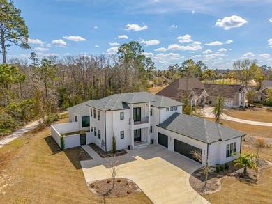 Experience luxury living in this meticulously maintained and on Oak Grove Island Golf and Country Club in Georgia - for sale on GolfHomes.com, golf home, golf lot