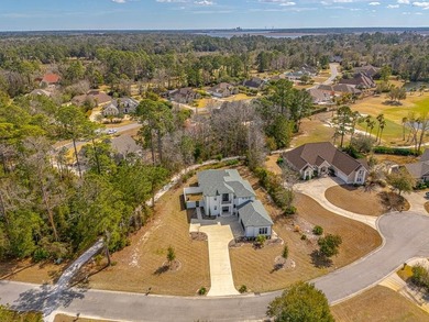 Experience luxury living in this meticulously maintained and on Oak Grove Island Golf and Country Club in Georgia - for sale on GolfHomes.com, golf home, golf lot
