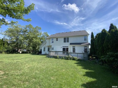 Located on a spacious corner lot just steps from the driving on WeaverRidge Golf Club in Illinois - for sale on GolfHomes.com, golf home, golf lot