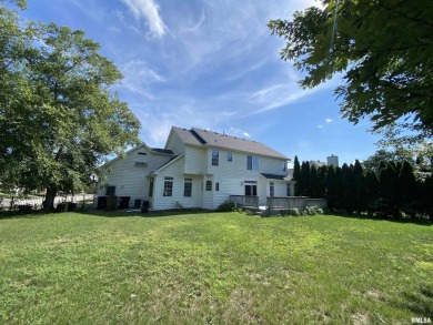 Located on a spacious corner lot just steps from the driving on WeaverRidge Golf Club in Illinois - for sale on GolfHomes.com, golf home, golf lot
