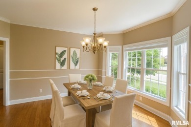 Located on a spacious corner lot just steps from the driving on WeaverRidge Golf Club in Illinois - for sale on GolfHomes.com, golf home, golf lot