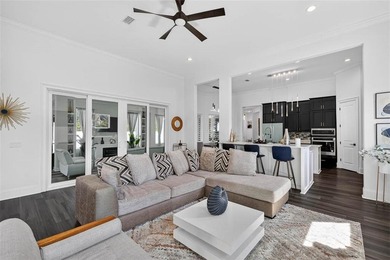 Experience luxury living in this meticulously maintained and on Oak Grove Island Golf and Country Club in Georgia - for sale on GolfHomes.com, golf home, golf lot