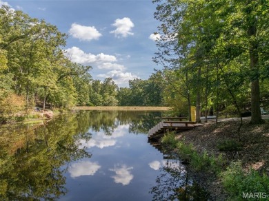 Escape to your own lakeside paradise at this super cute chalet on Innsbrook Resort Golf Course in Missouri - for sale on GolfHomes.com, golf home, golf lot