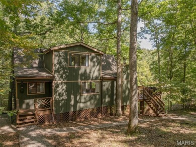 Escape to your own lakeside paradise at this super cute chalet on Innsbrook Resort Golf Course in Missouri - for sale on GolfHomes.com, golf home, golf lot