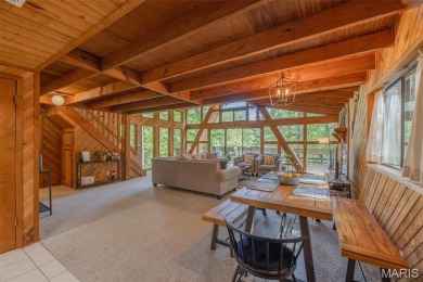 Escape to your own lakeside paradise at this super cute chalet on Innsbrook Resort Golf Course in Missouri - for sale on GolfHomes.com, golf home, golf lot