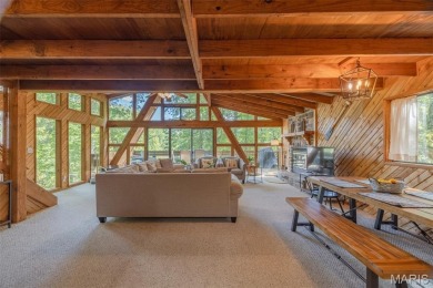 Escape to your own lakeside paradise at this super cute chalet on Innsbrook Resort Golf Course in Missouri - for sale on GolfHomes.com, golf home, golf lot
