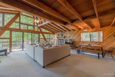 Escape to your own lakeside paradise at this super cute chalet on Innsbrook Resort Golf Course in Missouri - for sale on GolfHomes.com, golf home, golf lot