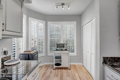 This well-maintained condo offers a bright, functional layout on Sun City Grand Golf Couse and Club in Arizona - for sale on GolfHomes.com, golf home, golf lot