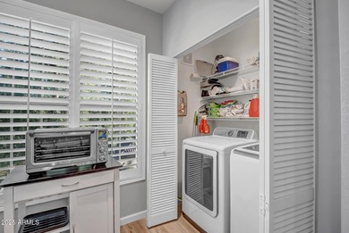 This well-maintained condo offers a bright, functional layout on Sun City Grand Golf Couse and Club in Arizona - for sale on GolfHomes.com, golf home, golf lot