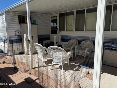 Lot's of living space in this 900 sf home located on the on Juniper Ridge R.V. Golf Resort in Arizona - for sale on GolfHomes.com, golf home, golf lot