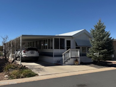 Lot's of living space in this 900 sf home located on the on Juniper Ridge R.V. Golf Resort in Arizona - for sale on GolfHomes.com, golf home, golf lot