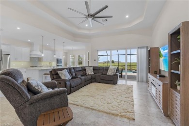 This exquisite *turn key* home, completed in 2022 by Taylor on The Golf Club At Fiddlers Creek in Florida - for sale on GolfHomes.com, golf home, golf lot