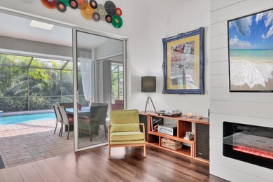 Walk through the front gate and courtyard to discover refined on The Meadows Golf and Country Club in Florida - for sale on GolfHomes.com, golf home, golf lot