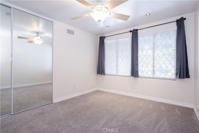 This Single Story home is nestled amidst gently rolling hills in on Vista Valencia Golf Course in California - for sale on GolfHomes.com, golf home, golf lot