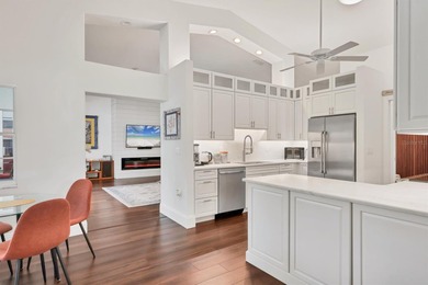 Walk through the front gate and courtyard to discover refined on The Meadows Golf and Country Club in Florida - for sale on GolfHomes.com, golf home, golf lot