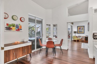 Walk through the front gate and courtyard to discover refined on The Meadows Golf and Country Club in Florida - for sale on GolfHomes.com, golf home, golf lot