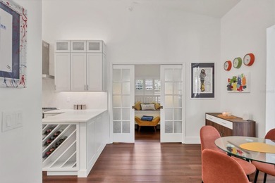 Walk through the front gate and courtyard to discover refined on The Meadows Golf and Country Club in Florida - for sale on GolfHomes.com, golf home, golf lot