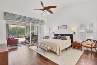 Walk through the front gate and courtyard to discover refined on The Meadows Golf and Country Club in Florida - for sale on GolfHomes.com, golf home, golf lot