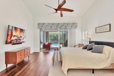 Walk through the front gate and courtyard to discover refined on The Meadows Golf and Country Club in Florida - for sale on GolfHomes.com, golf home, golf lot