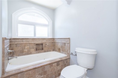 This Single Story home is nestled amidst gently rolling hills in on Vista Valencia Golf Course in California - for sale on GolfHomes.com, golf home, golf lot