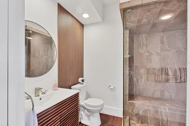 Walk through the front gate and courtyard to discover refined on The Meadows Golf and Country Club in Florida - for sale on GolfHomes.com, golf home, golf lot