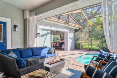 Walk through the front gate and courtyard to discover refined on The Meadows Golf and Country Club in Florida - for sale on GolfHomes.com, golf home, golf lot