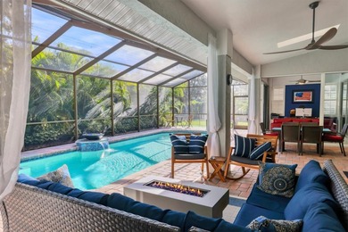 Walk through the front gate and courtyard to discover refined on The Meadows Golf and Country Club in Florida - for sale on GolfHomes.com, golf home, golf lot