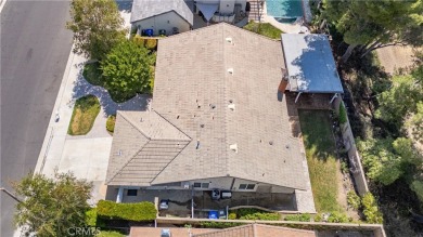 This Single Story home is nestled amidst gently rolling hills in on Vista Valencia Golf Course in California - for sale on GolfHomes.com, golf home, golf lot