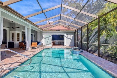 Walk through the front gate and courtyard to discover refined on The Meadows Golf and Country Club in Florida - for sale on GolfHomes.com, golf home, golf lot